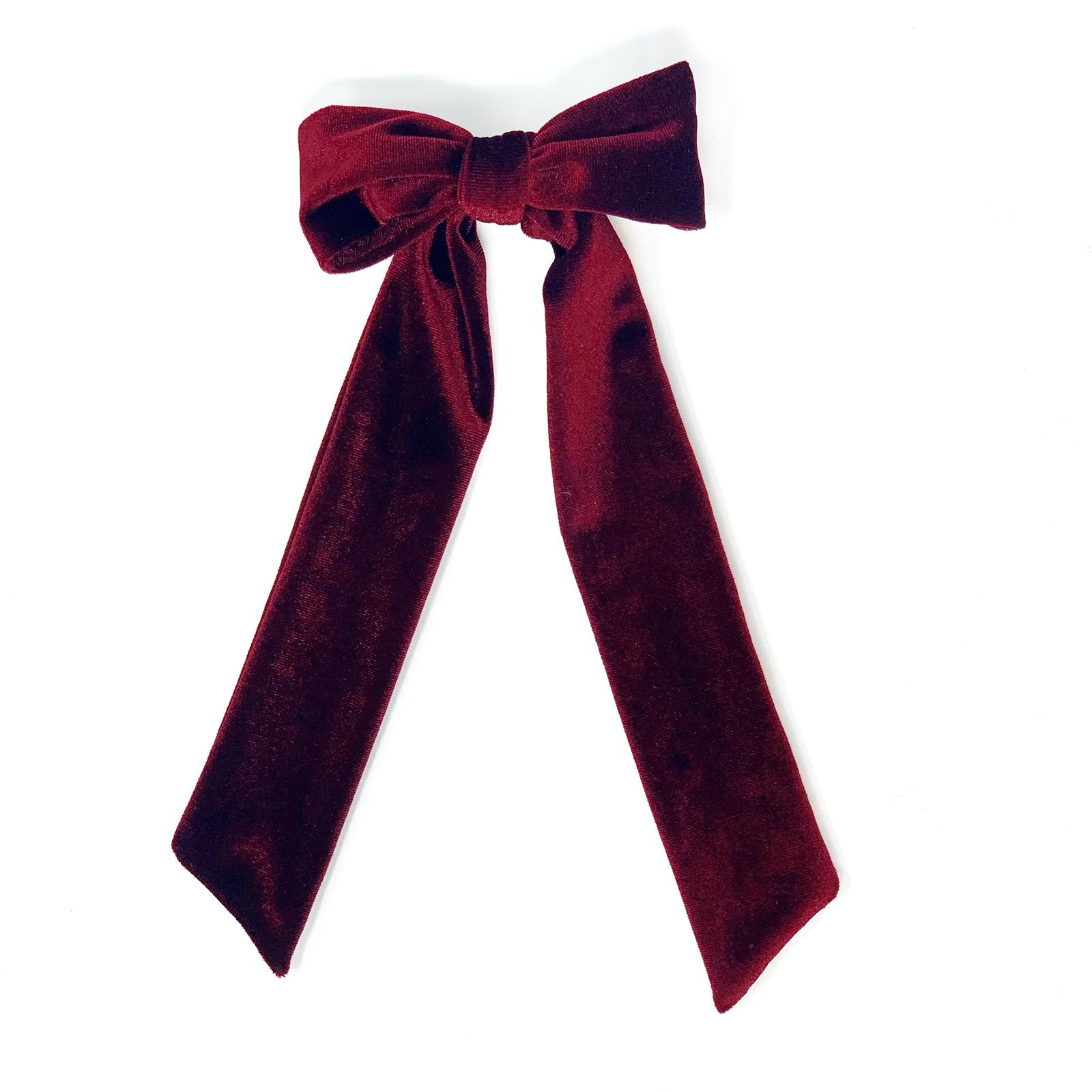 Hair clip with a long velvet bow in dark red color