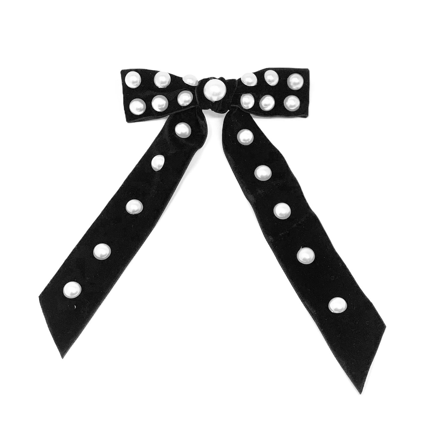 Hair clip with a big black bow , designed with pearls.
