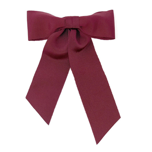 Hair clip with a big bow in red color