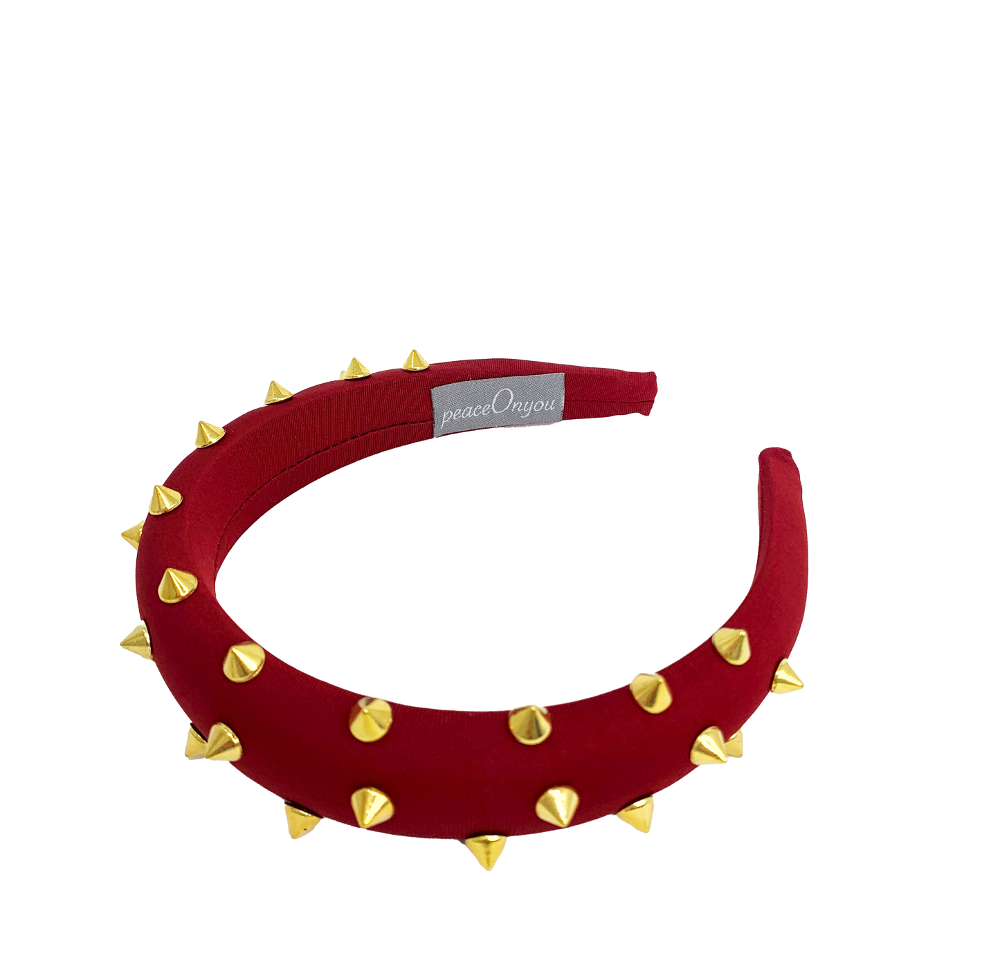 Red padded headband with gold spikes